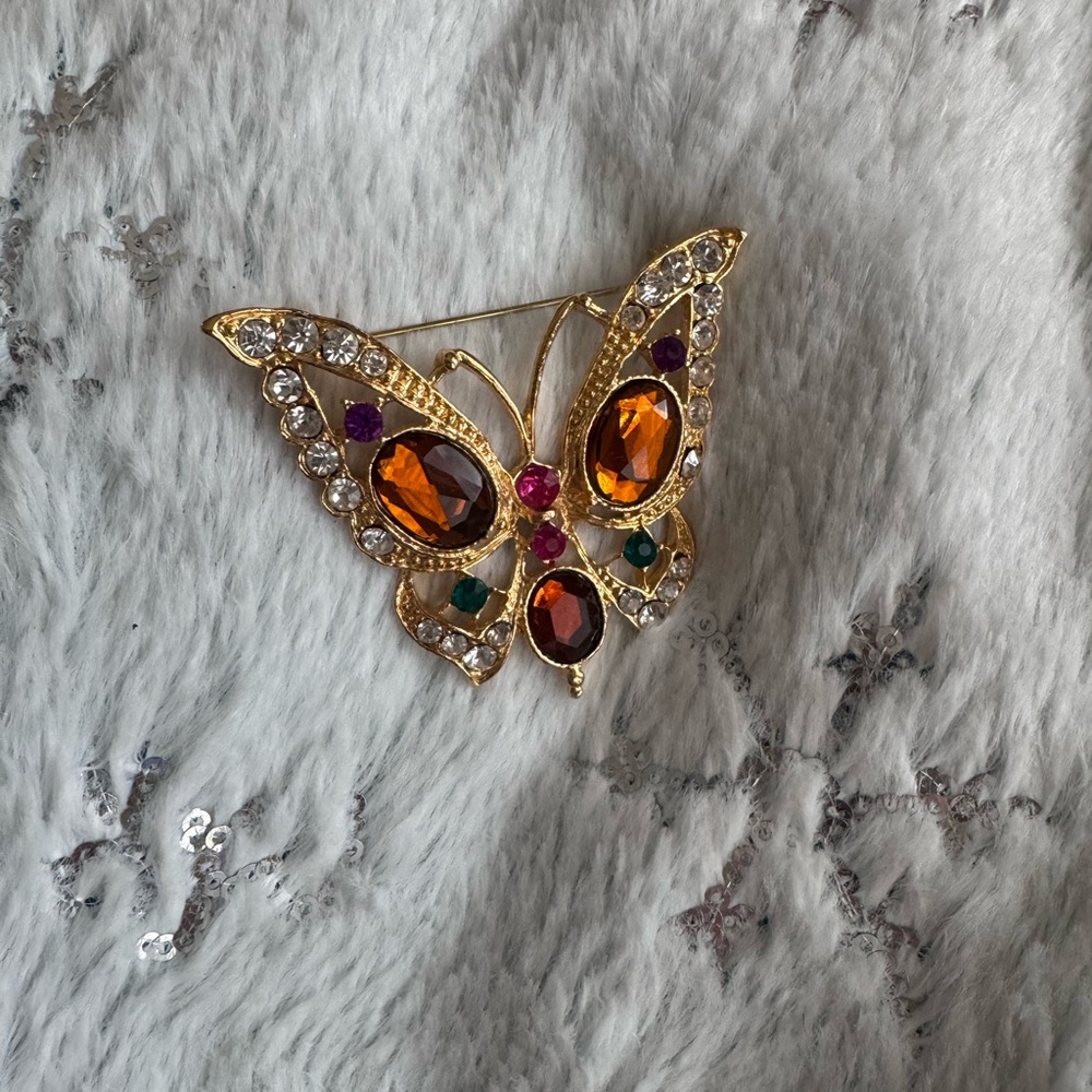 Elegant Gold Butterfly Brooch with Orange and Purple Accents
